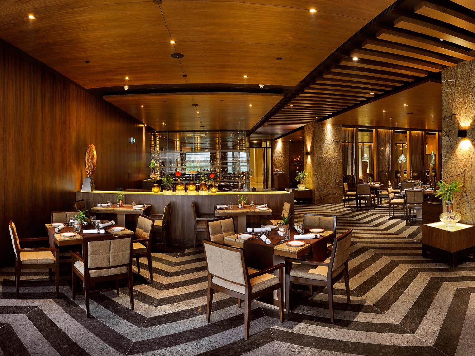 Hotel The Lalit Nueva Delhi Exterior foto The interior of the restaurant