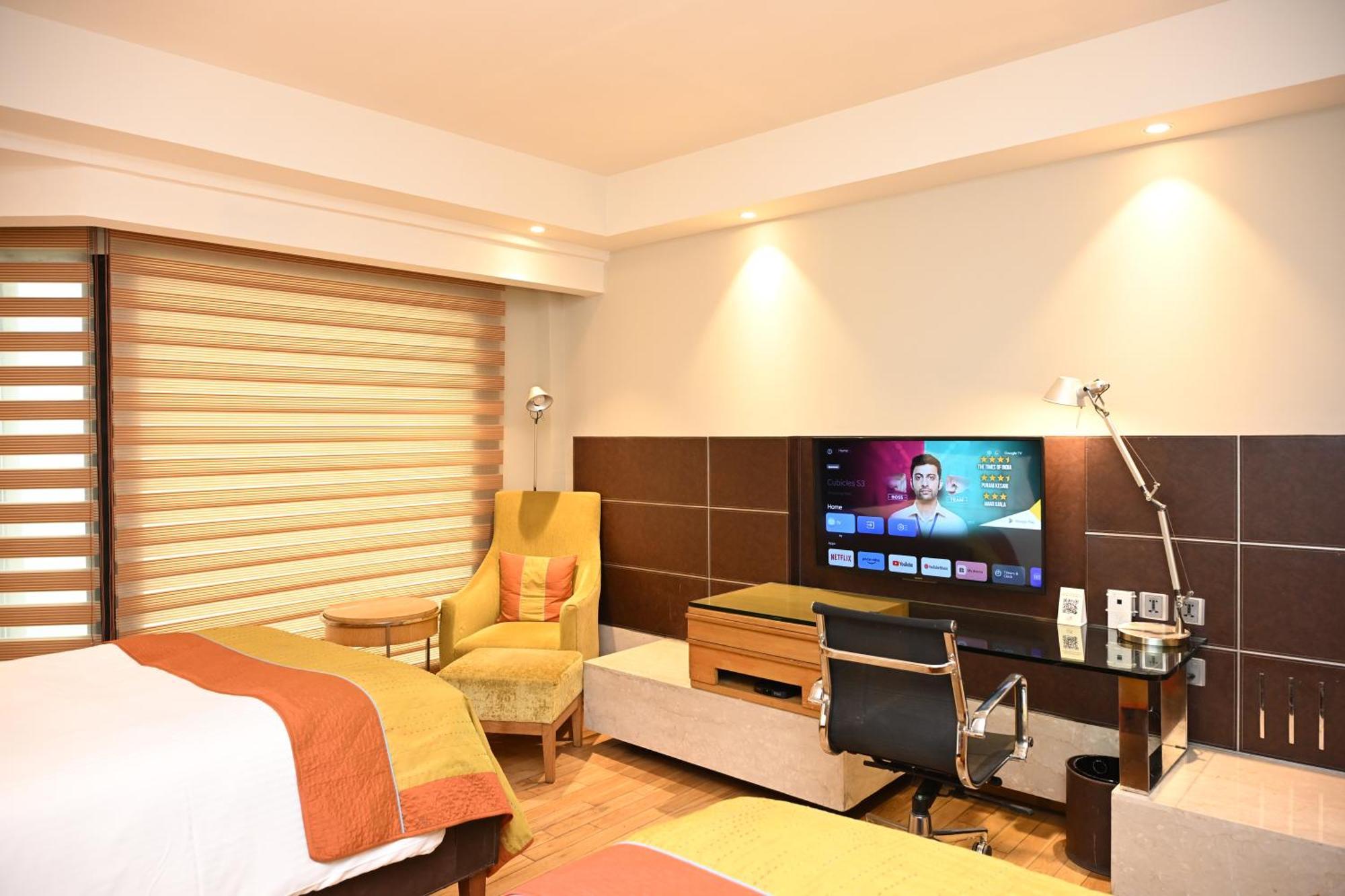 Hotel The Lalit Nueva Delhi Exterior foto A room at the hotel